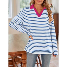 Camiseta de manga comprida listrada azul e branca com gola polo casual solta para mulher