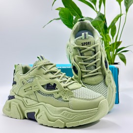 Sapatos casuais respiráveis ​​de malha explosiva com sola grossa e sapatos de pai absorventes de choque