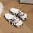 Chinelos Antiderrapantes com Estampa de Vaca Fofa - Sapatos Internos Macios em EVA para Homens e Mulheres, Design Slip-On, Conforto para Banheiro no Verão, Calçados Domésticos com Padrão de Vaca Cartoon