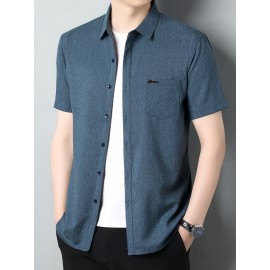 Camisa de manga curta para homem, ideal para o verão, com bolsos e conforto para a pele.