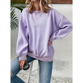 Camiseta de malha feminina de corte redondo e cor sólida para outono e inverno, com mangas longas e estilo casual.
